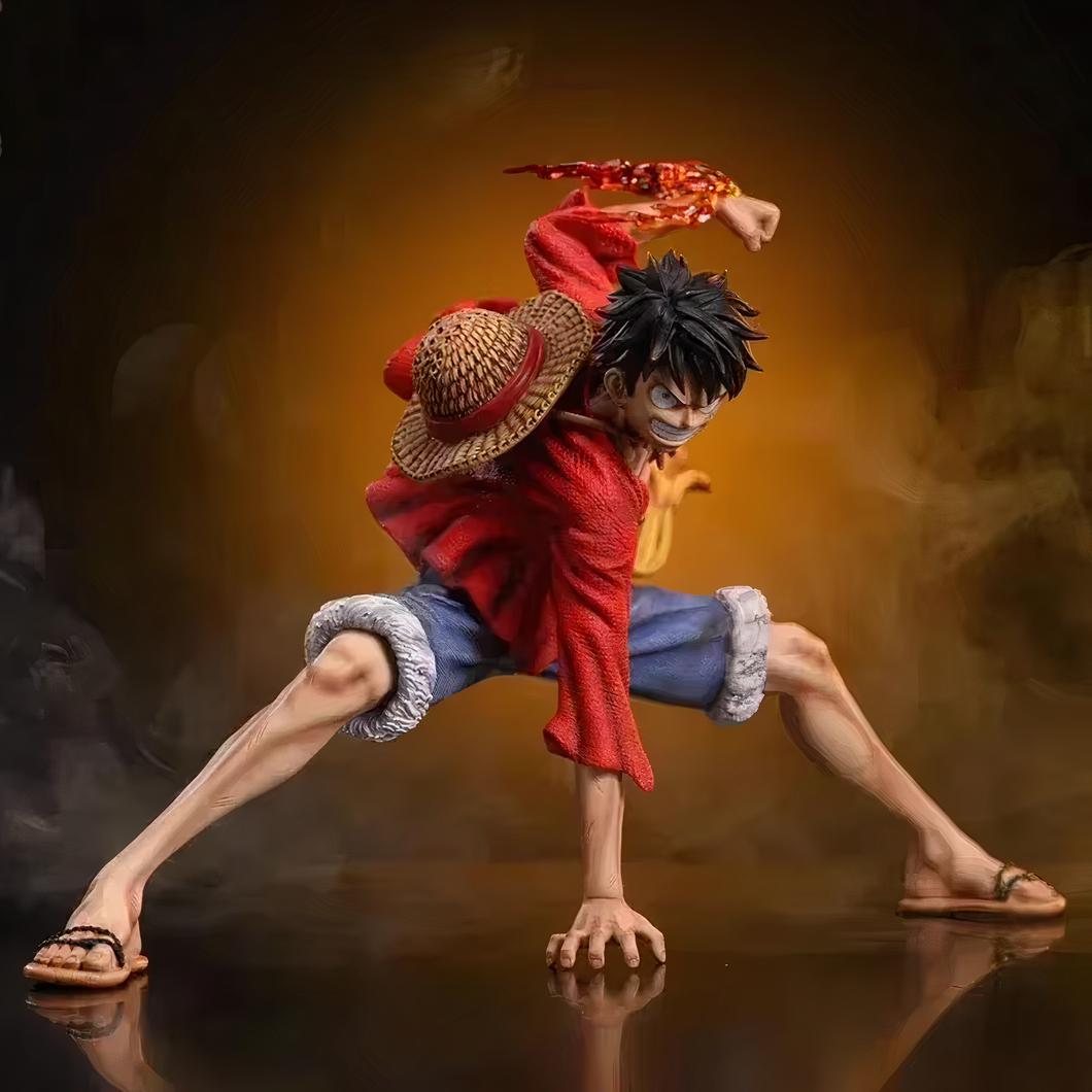 On voit une statuette de Luffy, one piece, le manga, en pleine action prêt à se battre