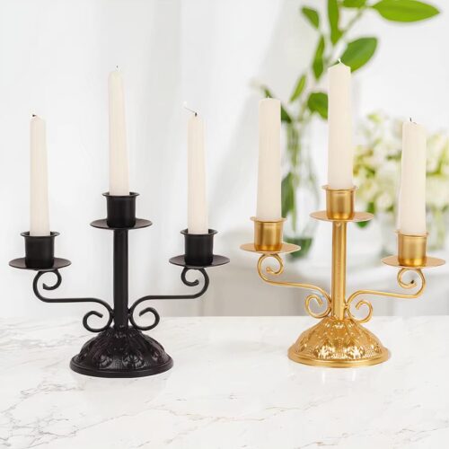 Deux chandeliers trois branches un noir et un doré