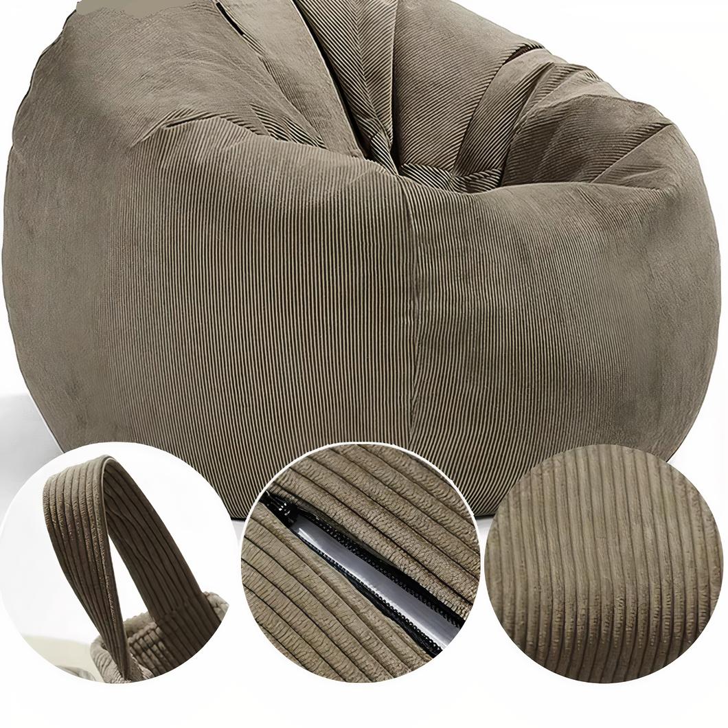Photo d'un pouf fauteuil en velours côtelé déhoussable de couleur gris sur fond blanc