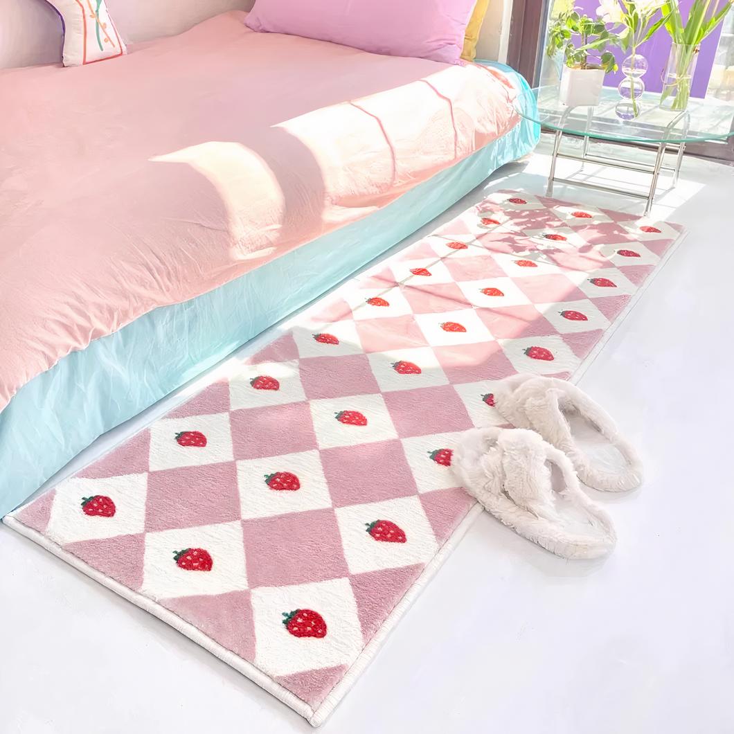 Tapis en damier rose aux motifs fraises