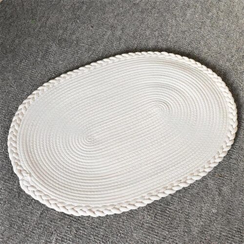 Tapis de sol oval imitation jute tissé